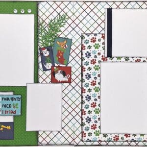 Christmas scrapbook with dogs and paw prints.